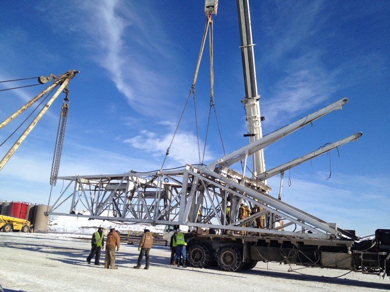 Crane Lifting Metal Piece of Tower — Vernal, UT — J&C Enterprises Inc.