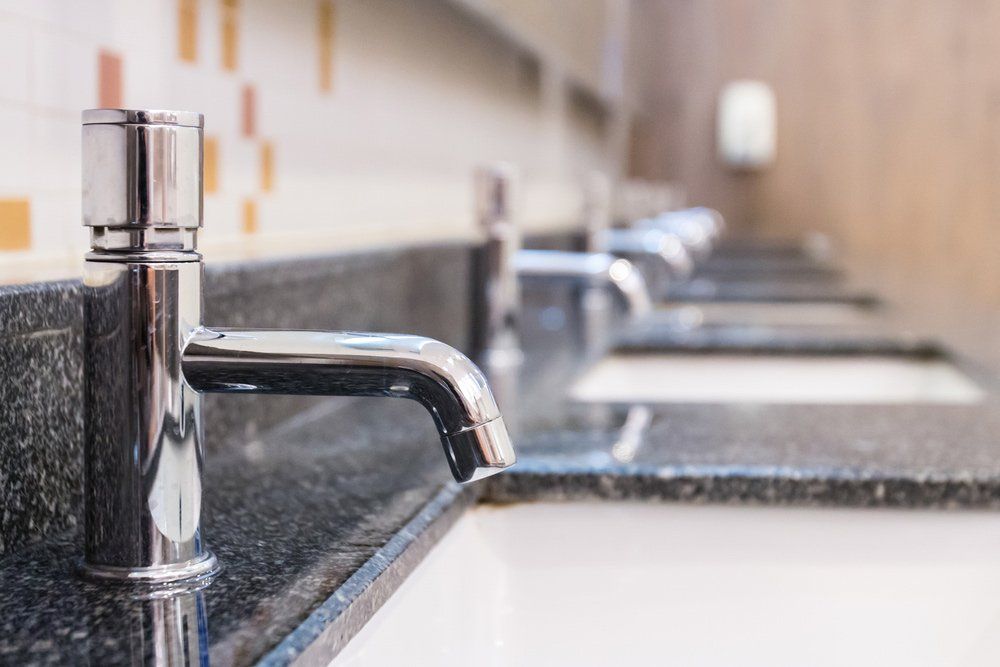 Water Tap Inside Restroom — Plumbers in Harlaxton, QLD
