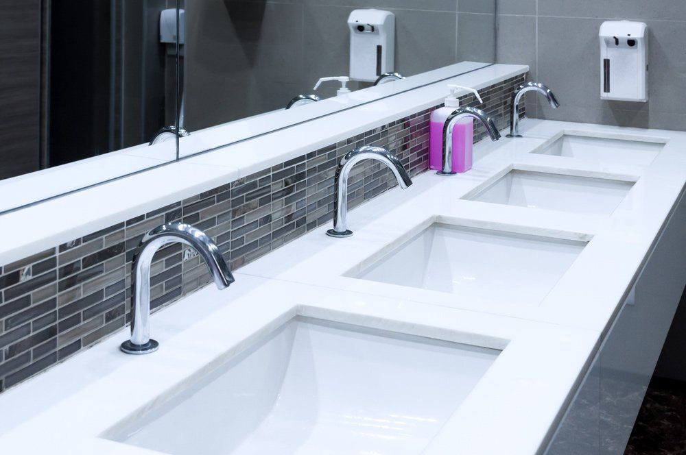 Workplace Bathroom Sinks — Plumbers in Harlaxton, QLD