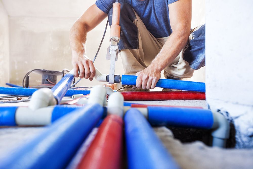 An Expert Plumber At Work