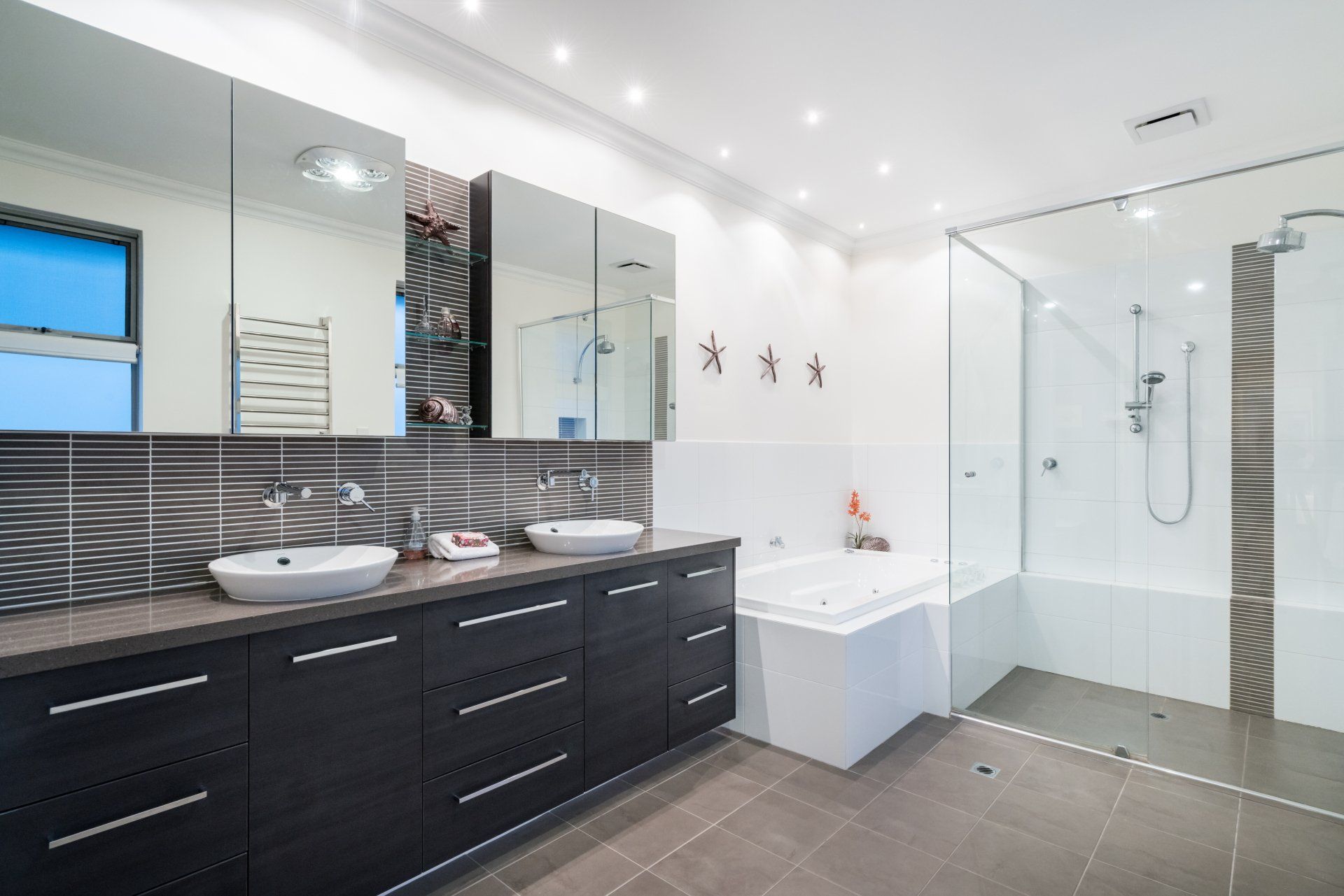Bathroom With Glass Shower Screen — Plumbers in Harlaxton, QLD