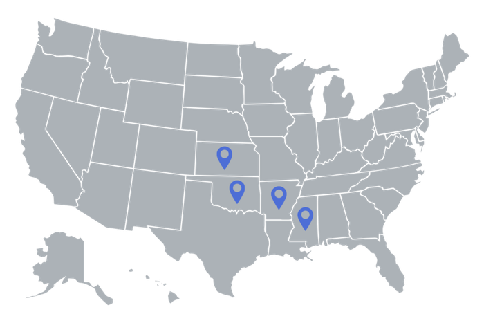 Gray U.S. map with four blue location pins in the Southwest and South Central regions
