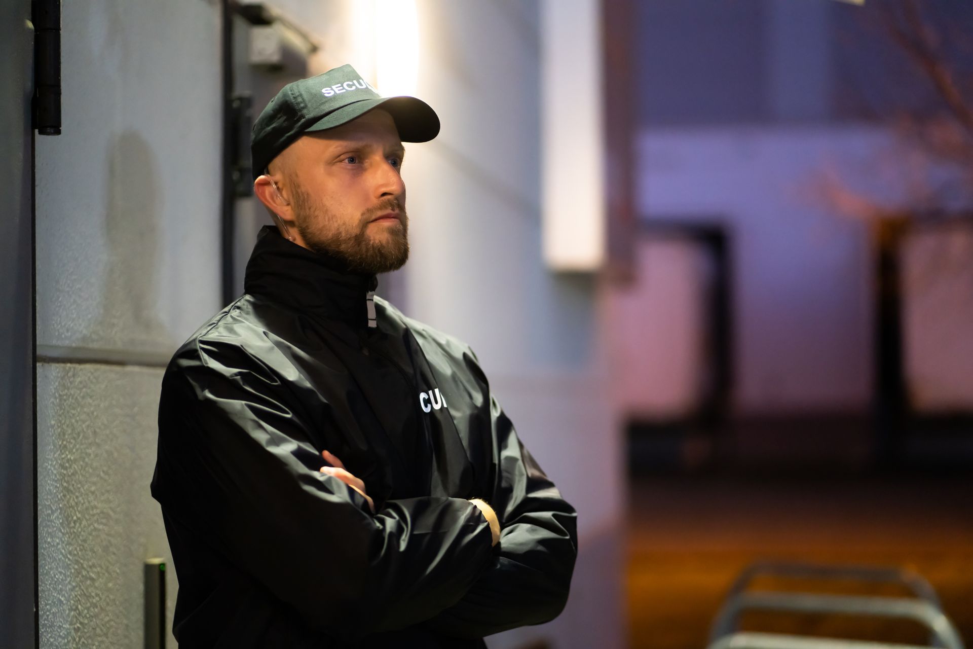 Security Guard in Black Jacket and Cap — Safe Guard Squad in Lismore, NSW
