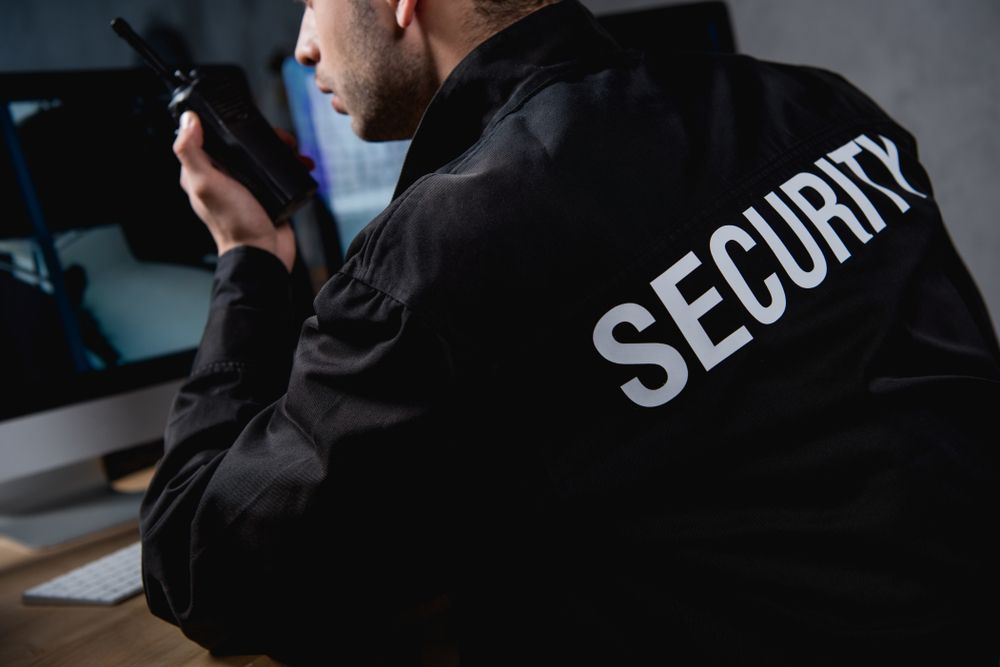 Security Guard Holding a Radio, Standing in A Store — Safe Guard Squad in Casino, NSW