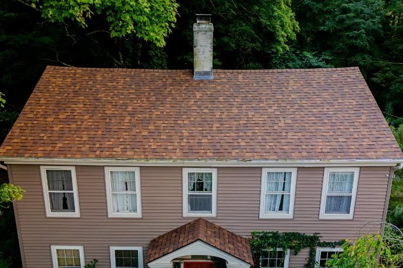roofline of old home with new roof