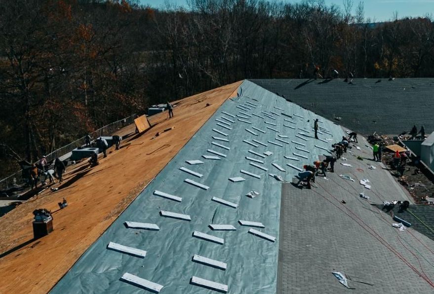 Damaged and missing shingles on a roof