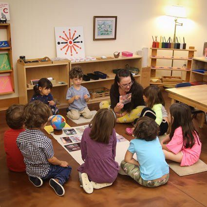 Children's House (preschool) group with guide
