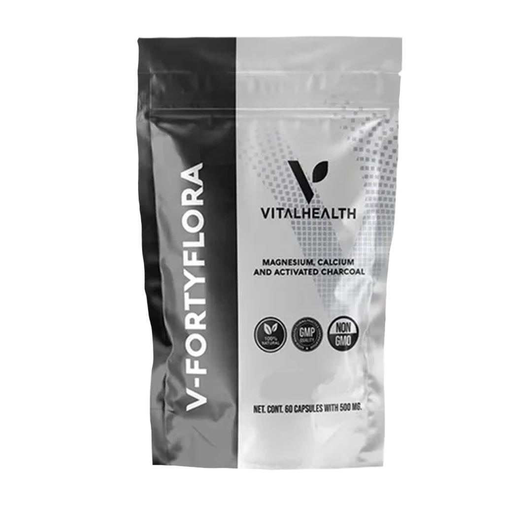 Bolsa de cápsulas Vital Health V-FORTYFLORA, diseño en blanco y negro. Contiene magnesio, calcio y carbón activado.