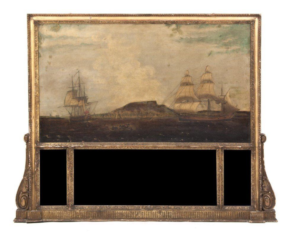 A picture frame with a picture of a ship on it