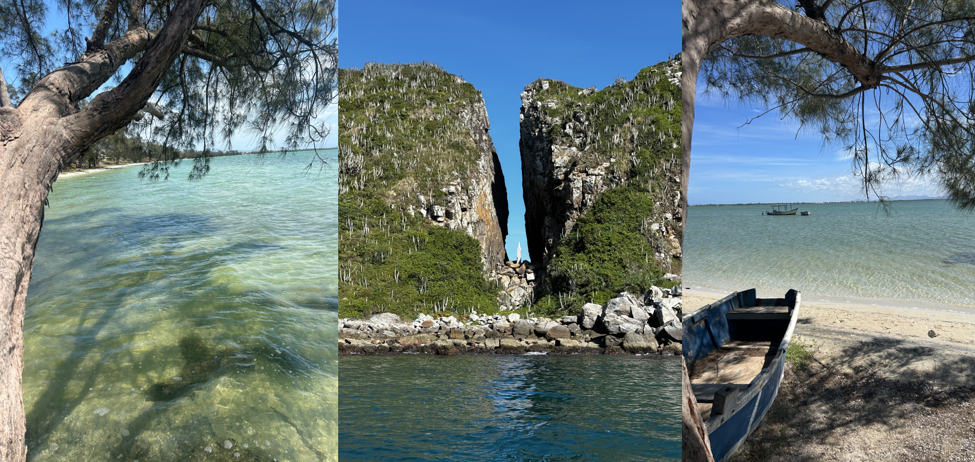 Vista panorâmica da costa: água turquesa, uma formação rochosa dividida e um pequeno barco na praia sob um céu azul límpido.