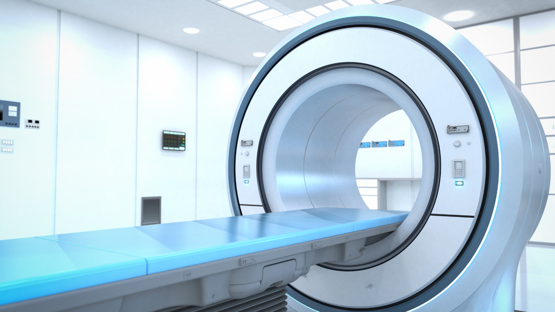 A mri machine is sitting on a table in a hospital room.