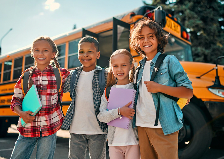 children standing ready for school