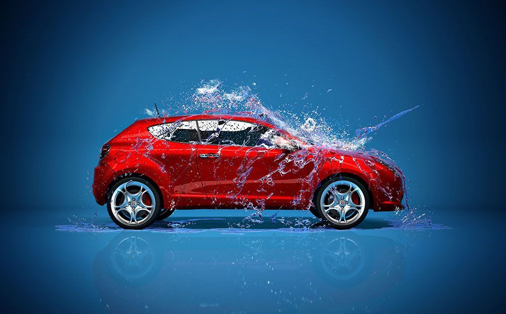 A red car is being washed with water on a blue background.