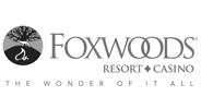 A black and white logo for foxwoods resort and casino.