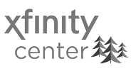 The xfinity center logo is black and white and has three trees on it.