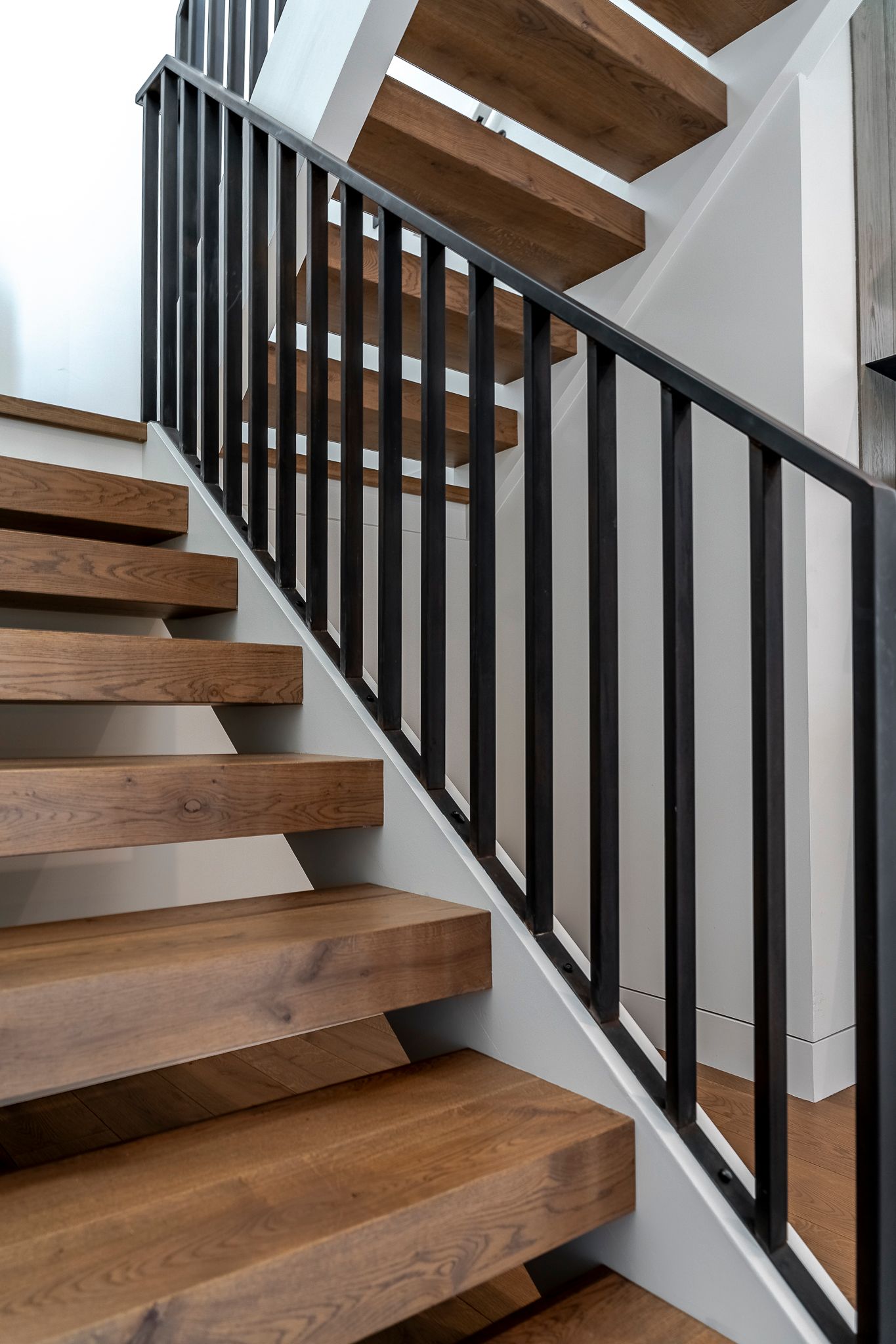Matching floating stair treads. 
