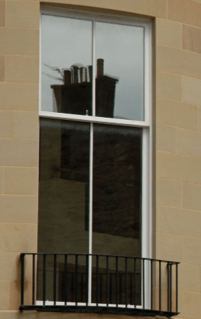 sash window  with metal balcony