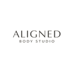 Aligned Body Studio logo on a cream background, with black serif text.