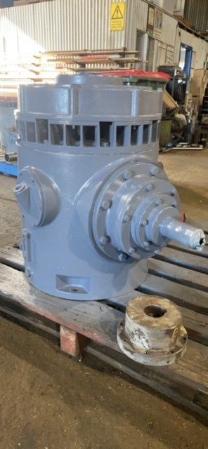 A large machine is sitting on top of a wooden pallet in a factory-Gearboxes in Australia