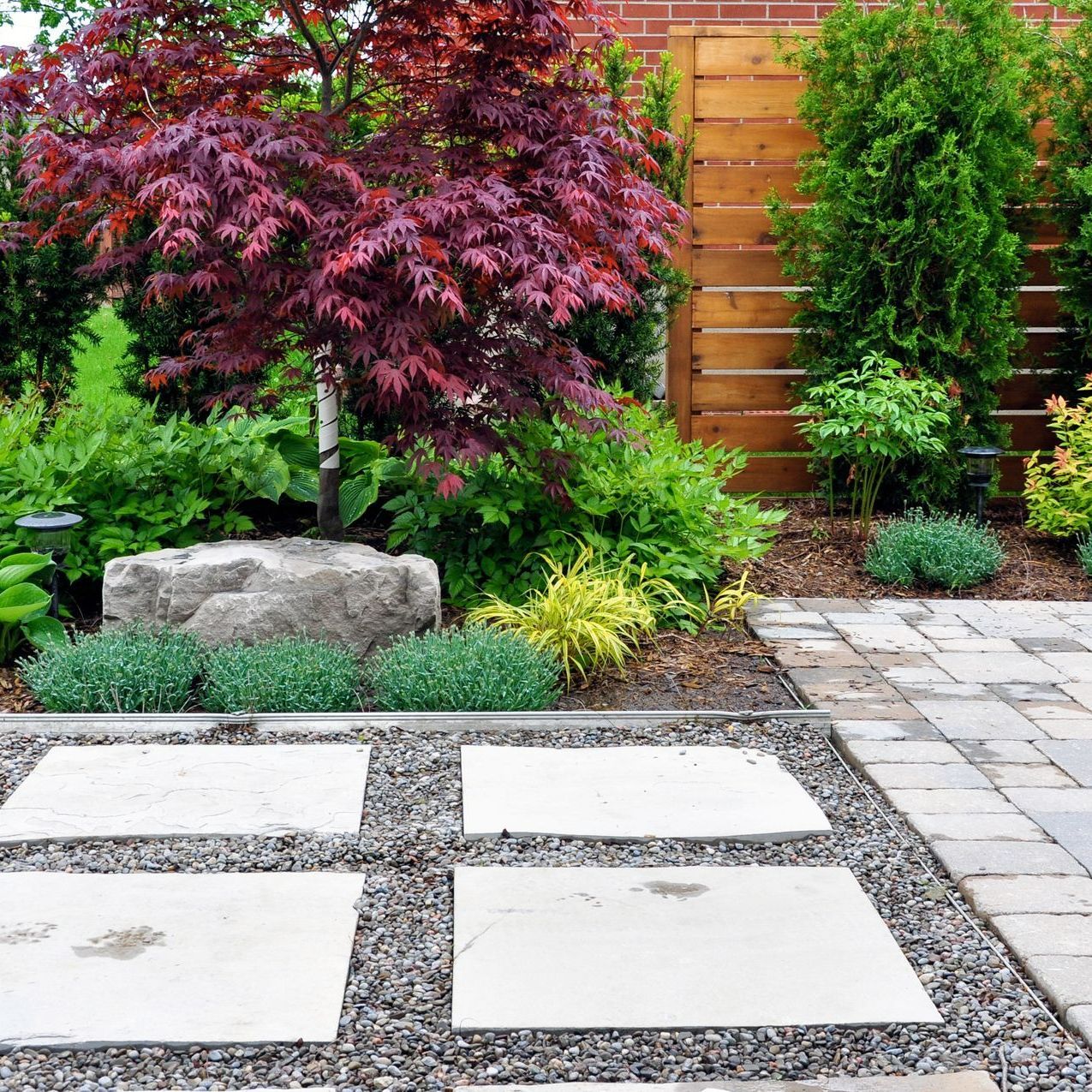 Hardscape Details of a Tumbled Paver Patio — Dover, NJ — Carlos Canfield Landscaping