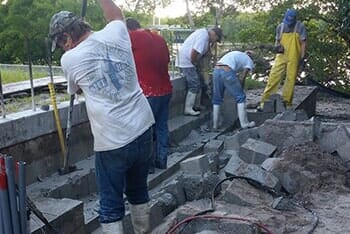 Concrete Removal — Worker Demolishing Concrete in Sarasota, FL