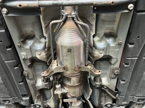 catalytic converter with security system