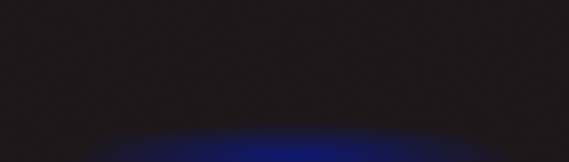 A blue light is shining on a black background. | Smith Specialty Automotive