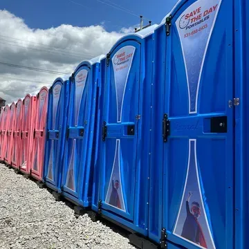 A row of blue and pink portable toilets that say save the day