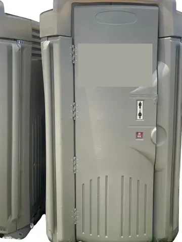 Two portable toilets are sitting next to each other on a white background.