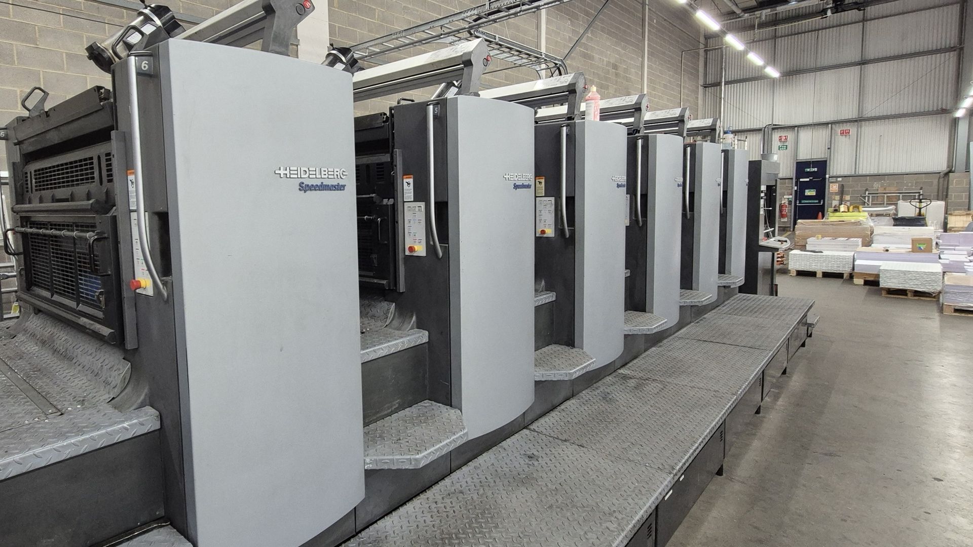 A Heidelberg 6-colour printing press large machine installed in an industrial building as part of a business relocation and factory fit out in Berkshire. A 200A 3-phase 400-415V electrical supply was installed by Matt Browning Electrical Contractors using SWA cable on cable ladder.