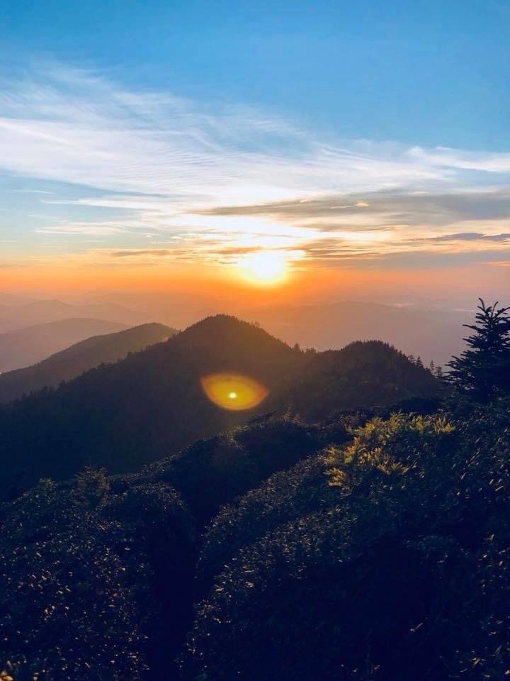 Image of gorgeous sunset behind the mountains.