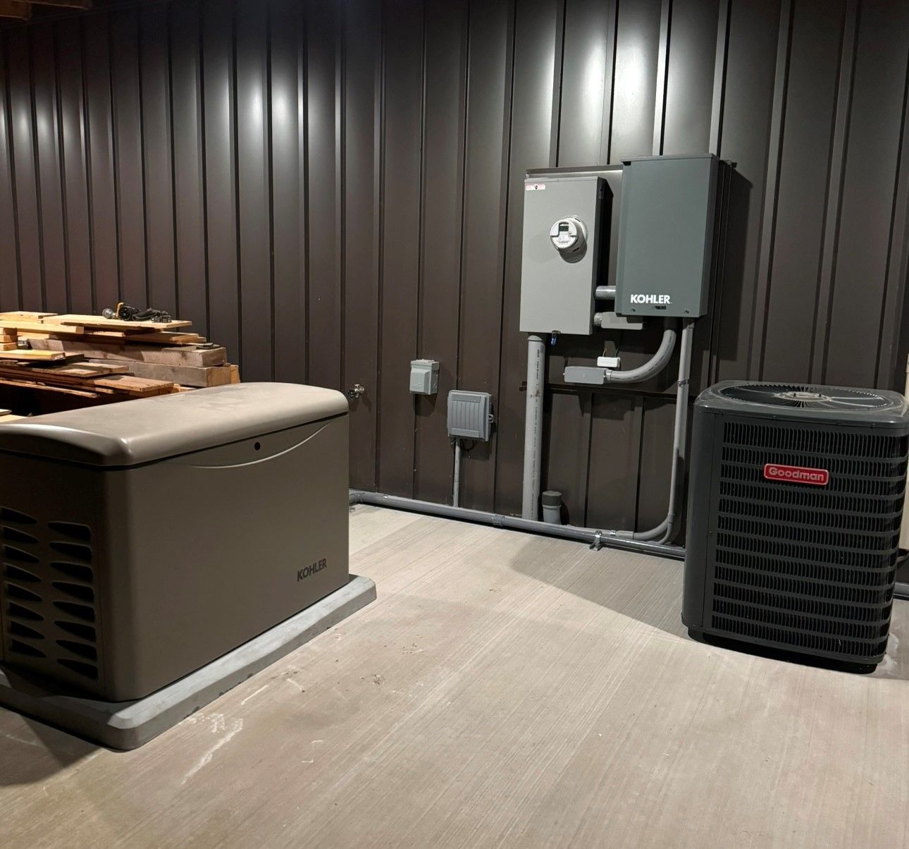 There is a generator and an air conditioner in the room.