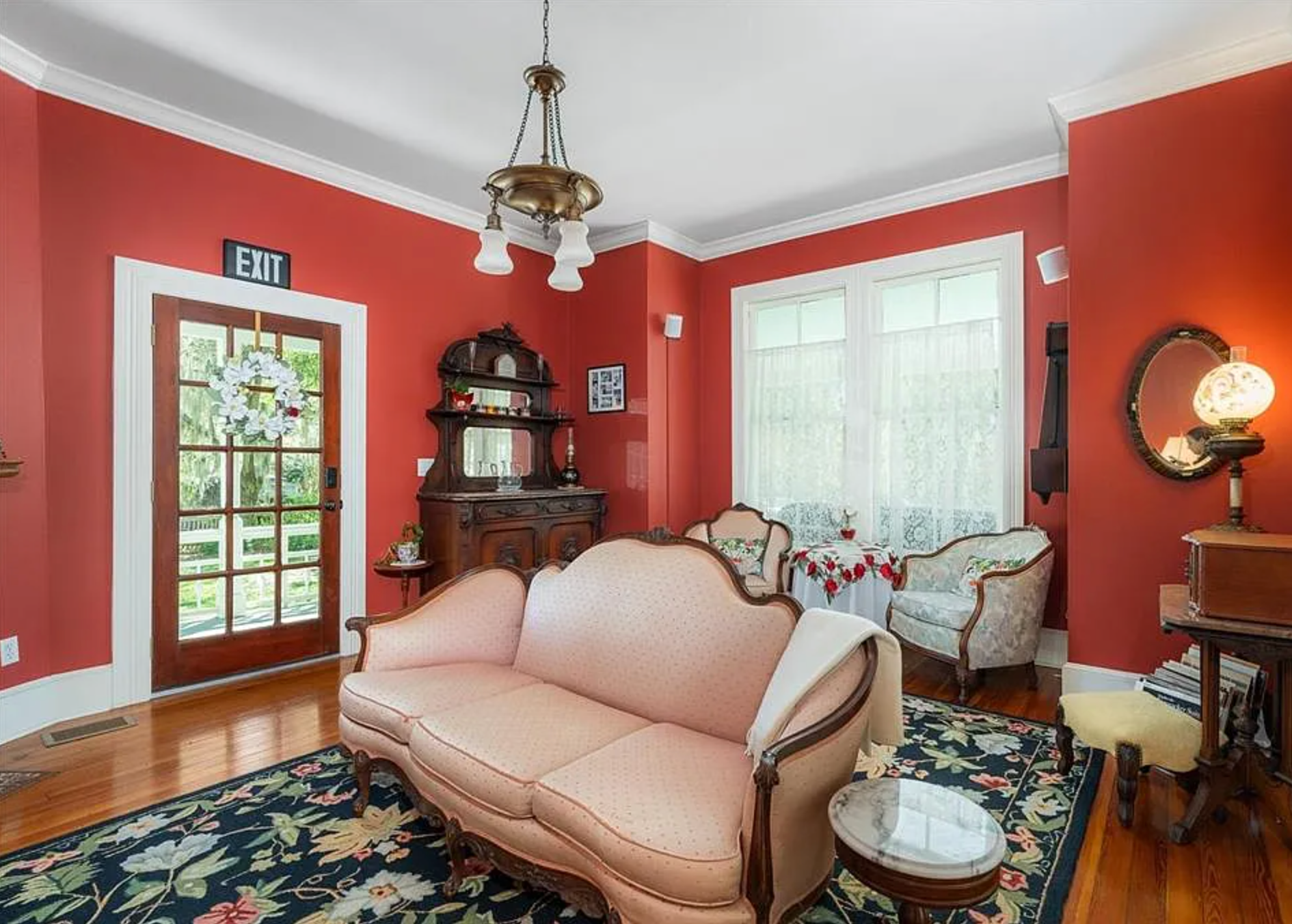 Red living room with couch - STR - GNV