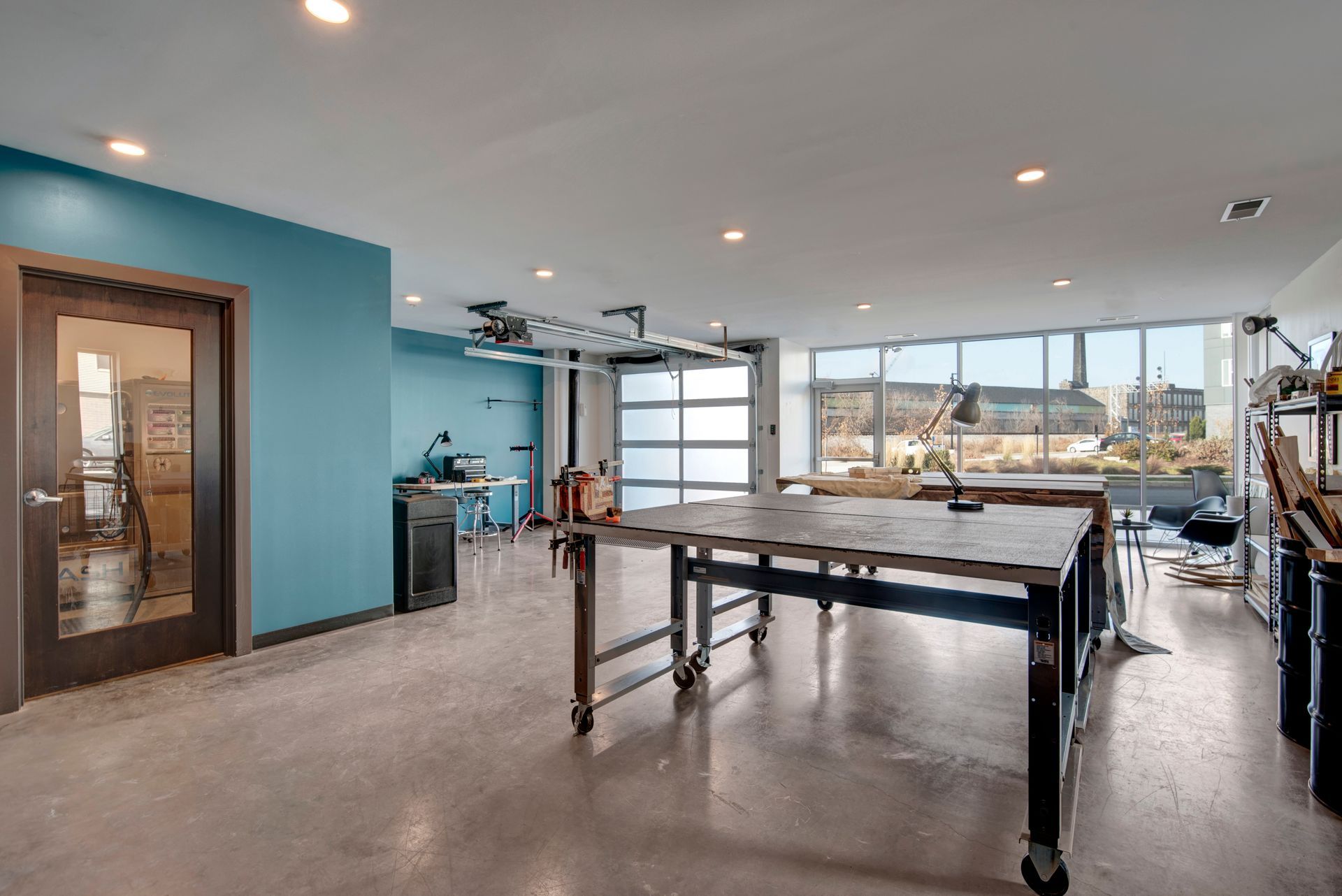 There is a large table in the middle of the room.