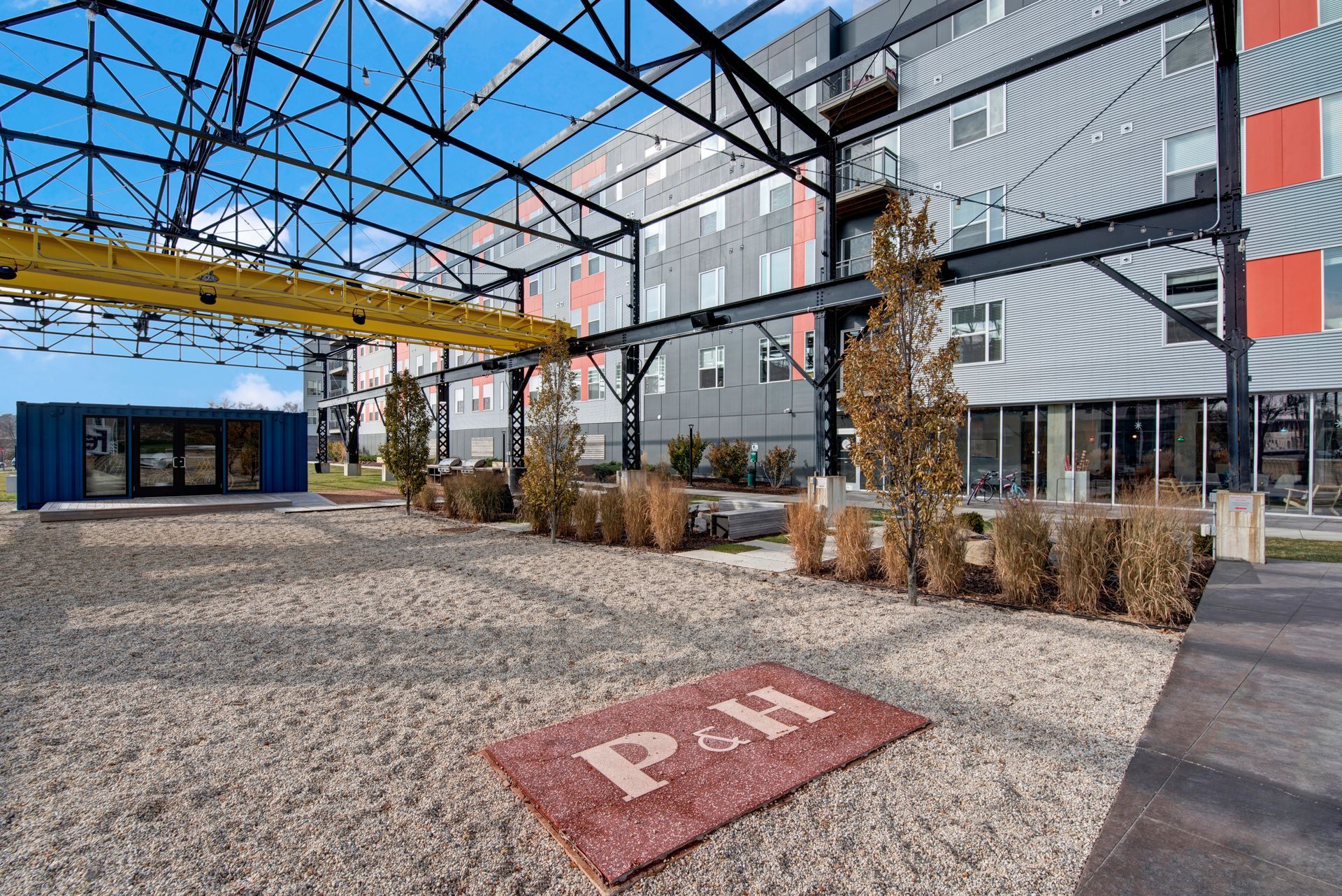 A large building with a red rug in front of it.