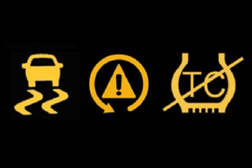 A set of yellow signs on a black background