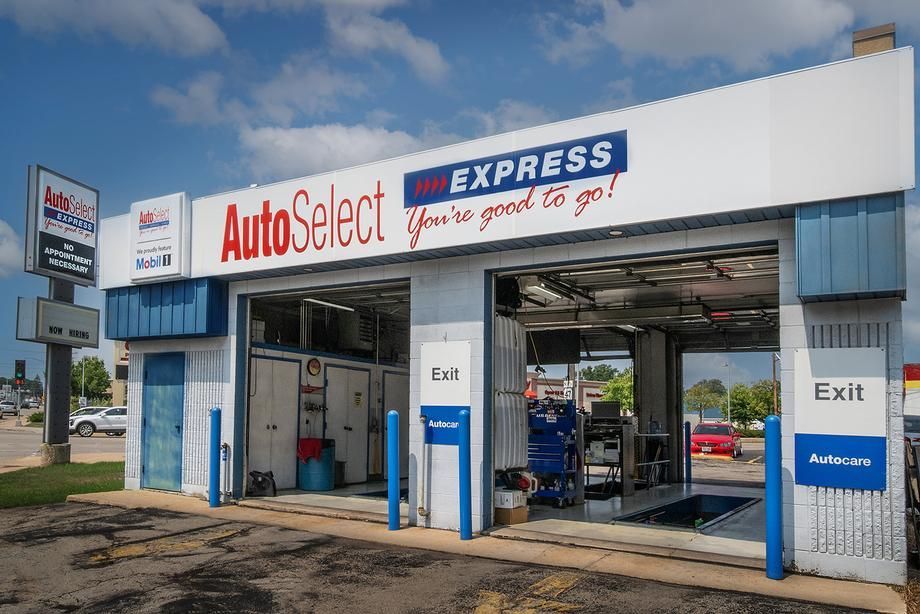 A white and blue building with a sign that says autoselect