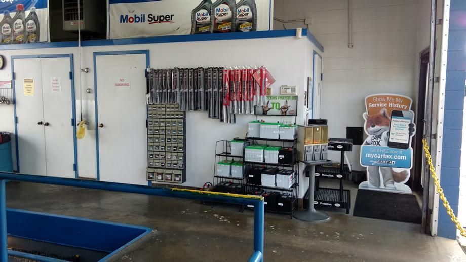 A garage with a sign that says mobil super on it