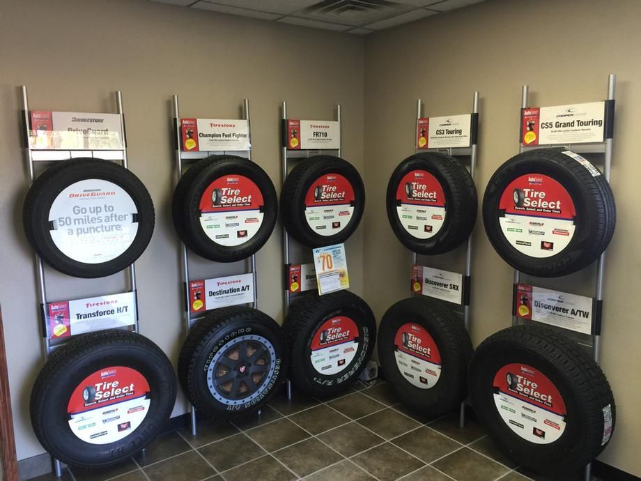 A room filled with lots of tires on display