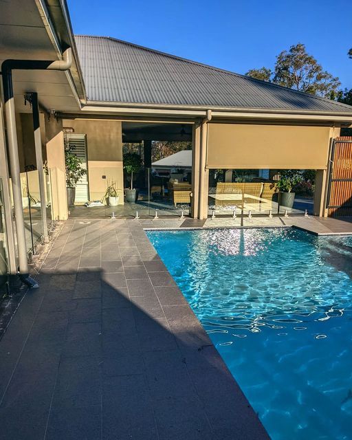 Newly Washed Outdoor Cement Near Pool — Pressure Cleaning in Bowral, NSW