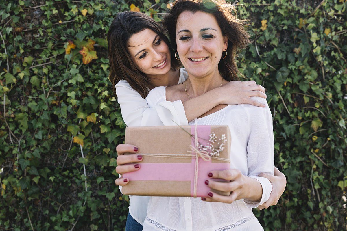 Daughter Hugging Her Mom — Melbourne, VIC — DonEast Dental