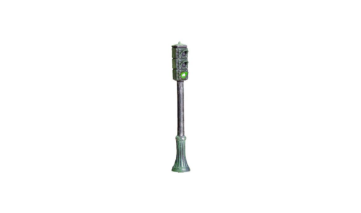 Tall green and gray mechanical tower-like object on a white background