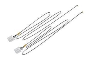 Two white electric heating elements with metal leads and connector plugs on a white background
