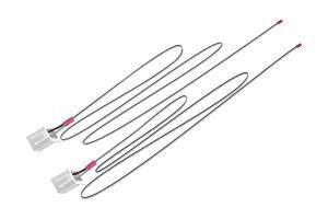 Two white electrical cords with red connectors, shown side by side on a white background