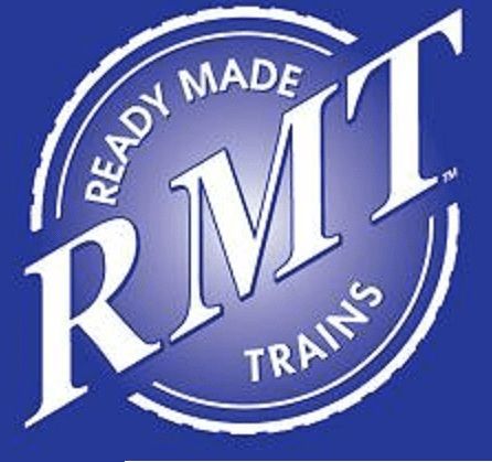 RMT Ready Made Trains logo in white on a blue circular background