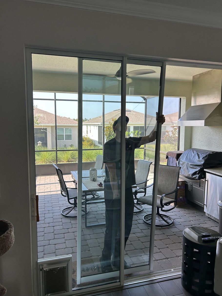 Home upgrade with new sliding glass door featuring secure locks and smooth operation.