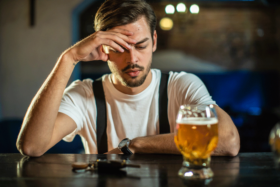 Man Drinking Beer — Mansfield, OH — John S. Dilts, Attorney