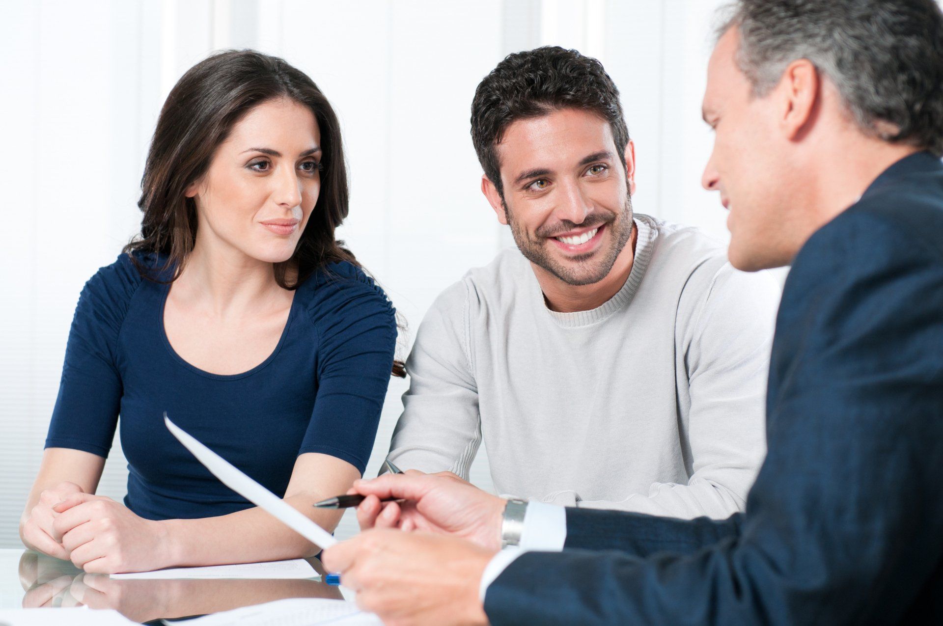 Couple Speaking with An Investment Consultant — Mansfield, OH — John S. Dilts, Attorney