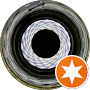 A close up of a tire with a star in the middle.