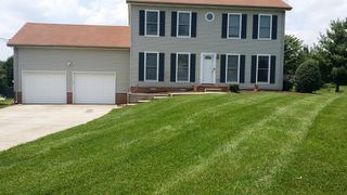 Lawn Mowing — Landscaping Maintenance of House in Clarksville, TN
